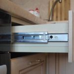 mécanisme à billes coulissantes dans des boîtes