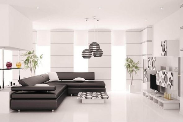 canapé noir dans le salon blanc