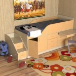 lit bébé à côtés avec commode