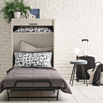 lit pliant dans le salon