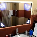 miroir avec éclairage et décor