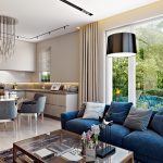 Dans le salon canapé bleu avec des oreillers