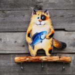 chat femme de ménage avec poisson