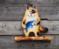 chat femme de ménage avec poisson