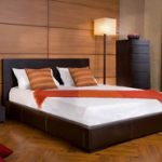Design moderne d'un lit dans une chambre