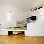 Podium avec mobilier intégré et lit gigogne