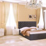 Chambre élégante avec un lit confortable avec une tête de lit douce