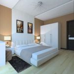 Mobilier blanc avec un design concis à l'intérieur de la chambre, fait dans le style du minimalisme