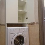 Armoire blanche pour machine à laver