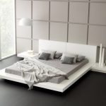 Différentes nuances de gris sont utilisées pour décorer cette chambre.