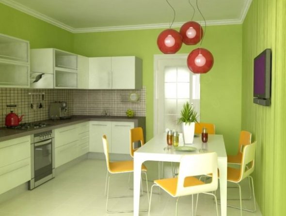 Cuisine dans les tons de vert avec des accents lumineux