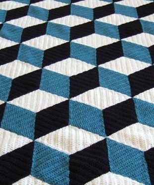 Plaid avec un motif de volume