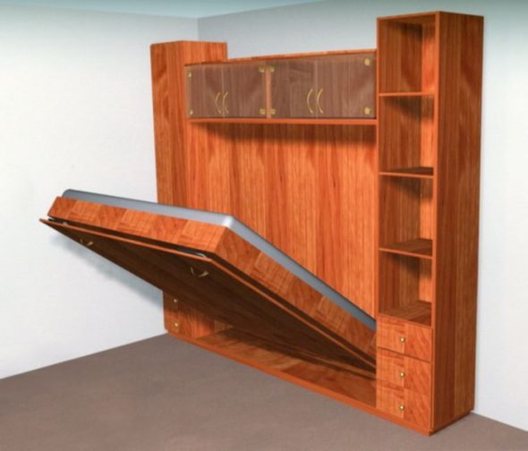Lit encastré dans une armoire en bois