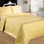 Couverture en bambou jacquard doré avec une large bordure autour du bord