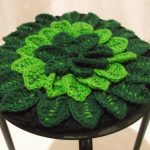 Coussin de chaise vert ajouré