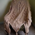 Plaid avec des glands pour une chaise ou un canapé