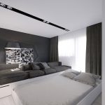 Utilisez le podium pour placer un grand canapé et un lit dans la même pièce
