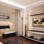 Niche avec un lit derrière une cloison en verre dans le salon