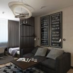 Grand salon avec un lit dans une niche et un canapé pour les invités