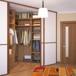 Dressing dans une armoire triangulaire