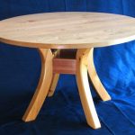 Table ronde simple sur pieds pliés