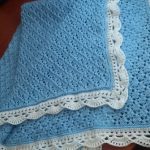 Couverture bleue avec bordure blanche pour garçon
