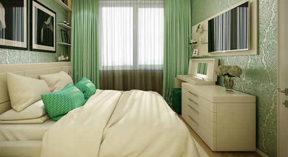 Commode en face du lit