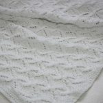 Plaid pour un tricot nouveau-né