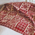 Couverture double face en maille jacquard