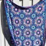 Plaid ajouré au crochet avec motifs floraux