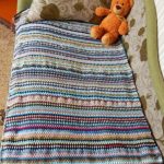 La couverture pour enfants dans une petite bande faites-le vous-même