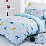 Ensemble de lit d'enfant en satin avec des dinosaures
