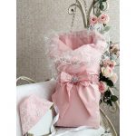 Enveloppe transformante toutes saisons, rose, avec un chapeau et un arc dans le kit