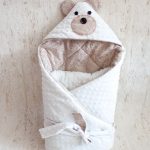 Ours en peluche transformateur enveloppe