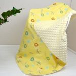 Couverture en peluche jaune et blanche pour bébé