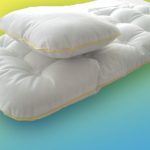 Matelas enfant dans un berceau en blanc