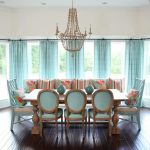 For the design of a wide window in the kitchen-dining room used metal wall cornice