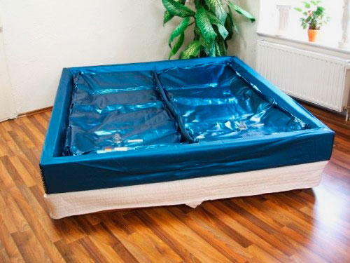 Lit sous le matelas à eau