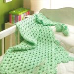 Couverture verte ajourée pour bébé