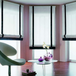 White and black Roman curtains for the interior in the style of minimalism.