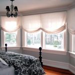 Frameless roman blinds for a huge bedroom window