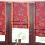 Two-tone Roman curtains with three canvases for a semicircular window
