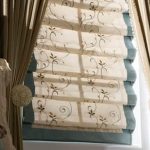Cascade curtains of two types of fabric look good in the interior