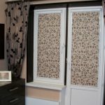 Classic blinds on the balcony door and window