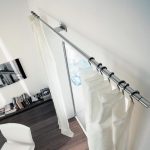 Barra de cortina redonda con ganchos de metal para cortinas