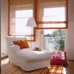 Semi-transparent Roman blinds for panoramic windows in the living room