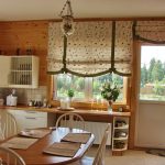 Roman curtains with bows for the kitchen window and door