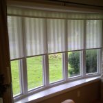 Fenêtre en PVC incurvée avec stores
