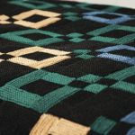 Couverture sombre avec un motif de motifs individuels