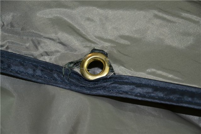 Mauvaise fixation de l'œillet sur l'auvent